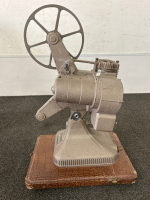 These Antique Keystone Projectors will take your breath away with the history and love of film that flows from them!! Keystone 6mm Projector Model K-I60 and Keystone 8mm Projector Model K-I08. These beauties are a piece of art!! (For display only). - 5