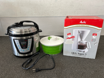 Let’s get cooking!! PressurePro Multi-Cooker (works!), Salad Spinner and a Melitta Coffee Perfection 2-5 Cup Coffeemaker with Interval Brewing System (looks new in the box!).