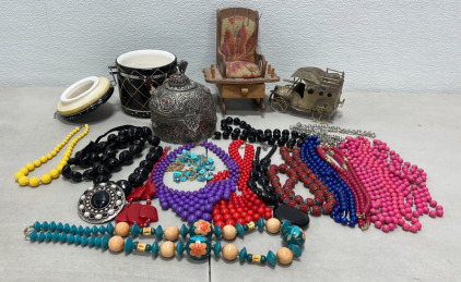 (17) Various Ladies Costume/Craft Necklaces, (1) Silver And Red Jewelry Box, (1) Rocking Chair Pin Cushion+