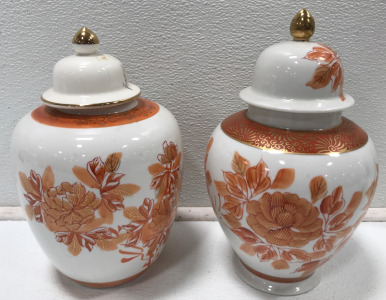 (2) Round Orange Vases With Lids