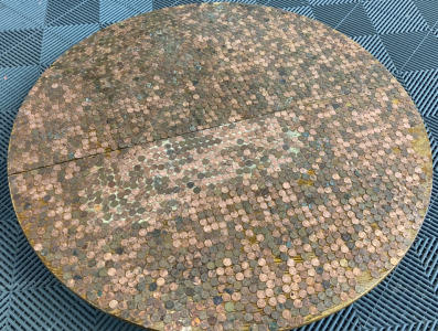 Round Wood Table Top Covered in Pennies