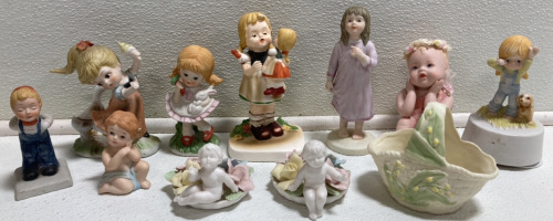 (11) Small Ceramic Figures: (7) Children, (3) Cherubs, (1) Basket