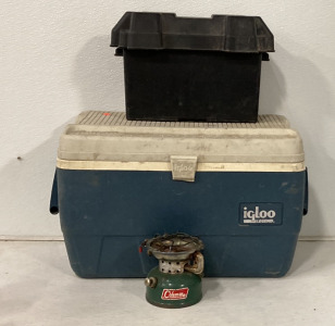 (1) 24’’ x 14’’ x 15’’ Igloo Legend Cooler, (1) 17’’ x 10’’ 11 Sterling Battery Co. Storage Box And Coleman Mini Stove