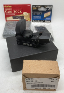 Electro red dot sight in box with mounting tool and batteries: Plus more.