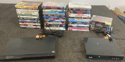 51 DVDs And 2 DVD Players, Both Power On