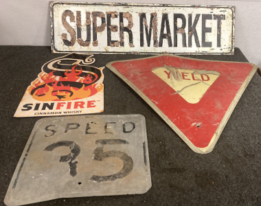3 Street Signs And Whiskey Sign