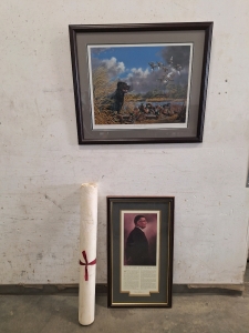 "My Masters Late Again" Painting By Harold Roe, "What It Takes To Be Number One" Framed Art Piece, And A Roll of Frame Backing Material