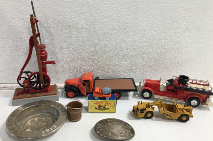 (1) 1941 Chevy Flatbed Toy Truck 8”x2.5” (1) John Deere Co. Fire Truck 8”x3” (1) CAT Tractor 6”x1.5” & More!