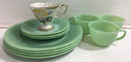 (4)Fire King Oven Ware 9” Dinner Plates (3) Fire King Oven Ware Tea Cups (3) Fire King Saucers (1) Japanese Cup