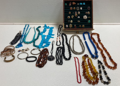 (14) Assorted Fashion Necklaces, (3) Strands of Unique Beads, (1) Set of Bangles, (5) Bracelets, (31) Assorted Fashion Rings - Drawer Not Included