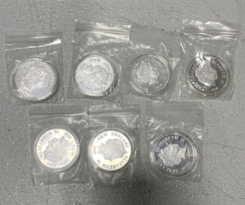 (7) Collectible Disney New Zealand Silver Coins