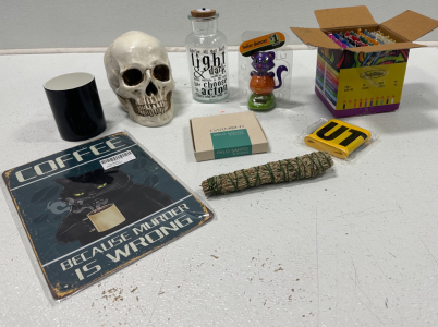 (1) Skull (1) Light Up Potion Bottle (1) Witchcraft Candles & More!