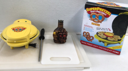 (2) 14”x20” Plastic Cutting Board (1) Super Pretzel Maker in Box (1) Playas Del CoCo Flask & More!