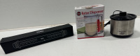 (1) Little Dipper Crock Pot (1) MKG Rolling Pin (1) Norpro Batter Dispenser