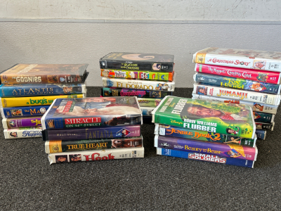 VINTAGE VHS COLLECTION INCLUDING: THE GOONIES, THE NIGHTMARE BEFORE CHRISTMAS, A CHRISTMAS STORY AND MORE!!