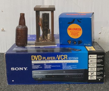 SONY DVD PLAYER/ VCR SLV-D380P W/ HALLOWEEN ELECTRIFIED CERAMIC PUMPKIN AND MORE; PLEASE INSPECT