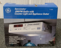 SPACEMAKER AM/FM RADIO (TURNS ON) WITH COUNTER LIGHT AND APPLIANCE OUTLET