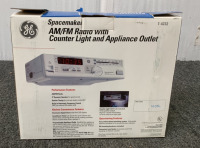 SPACEMAKER AM/FM RADIO (TURNS ON) WITH COUNTER LIGHT AND APPLIANCE OUTLET - 2