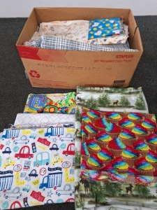 BOX OF FABRIC WITH DIFFERENT VARIETIES OF DESIGNS; PLEASE INSPECT