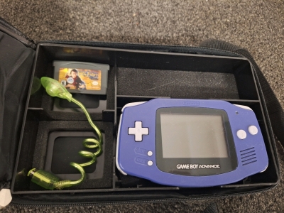 GAMEBOY ADVANCE WITH LIGHT AND HARRY POTTER GAME; PLEASE INSPECT
