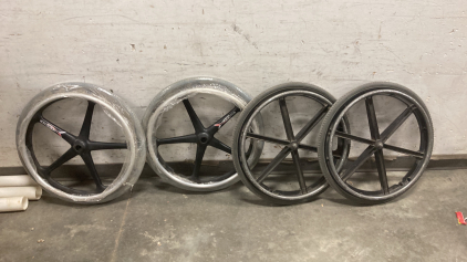 2 SETS OF WHEELCHAIRS WHEELS ONE SET LIKE NEW; PLEASE INSPECT