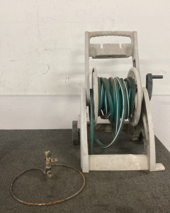 HOSE AND HOSE REEL WITH SPRINKLER NOT TESTED; PLEASE INSPECT
