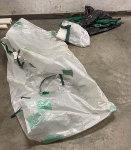 SMALL MOBILE GREENHOUSE HAS POLES AND INSTRUCTIONS; PLEASE INSPECT
