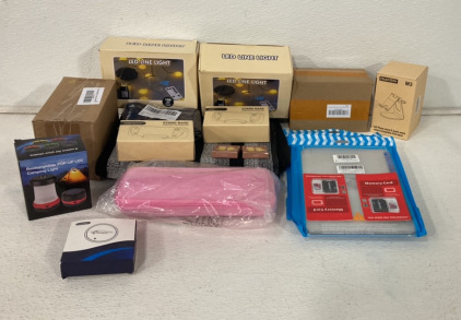 (2) 15m Of LED Line Lights, (1) Heacy Duty Doormat, (2) 512GB Memory Cards, (1) Rechargeable Pop-Up LED Camping Light, (1) HeahGite Cell Phone, Ipad And Apple Watch Stand
