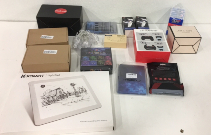 (1) Qyzl 75&rsquo; LED Light Strip (4) Various Tablet Hard Cases (1) Xenart Writing Lightpad (2) Vive Fix Ps5 Charger Docks And More