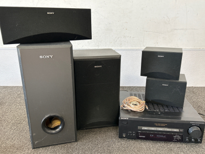 SONY STEREO SYSTEM (POWERS ON) ONE SPEAKER HAS MINOR CHIP, SUBWOOFER NEEDS SPEAKER GLUED BACK IN; PLEASE INSPECT