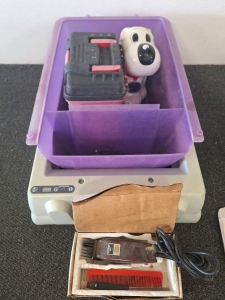 PET CARE STATION FOR SMALL DOGS WITH ANIMAL CLIPPER TRIMMERS, A DOG TREAT CONTAINER THAT PLAYS TWO SONGS (TESTED, WORKS, NEEDS BATTERIES) AND MORE