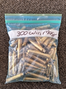 BAG OF SPENT/UNPRIMED 300 WIN MAG SHELL CASES