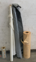 ROLL OF GREY PLASTIC MATERIAL, BROWN ROLL OF THIN PAPER AND WHITE ROLL OF THIN PAPER W/ ROLL OF THIN PLASTIC MATERIAL