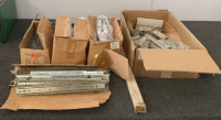 (2)BOXES OF DRAWER SLIDES, (1)CUPBOARD CHANNELS, (3) HINGES TRU-TRAC DOOR SLIDES, (10)REEVE STANDARD BRILLATONE