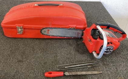 HOMELITE CHAINSAW WITH CHAIN FILES AND CASE - NOT TESTED - PLEASE INSPECT