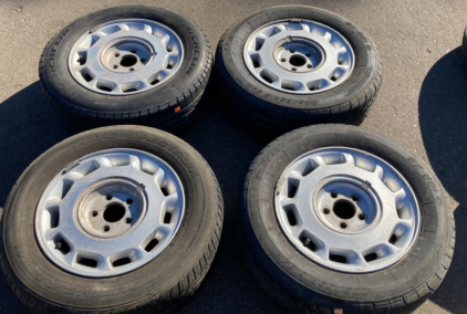 FORD 5-BOLT ALUMINUM RIMS WITH 205/65R15 TIRES