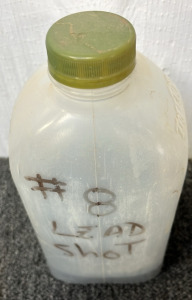 1/8 JUG OF #8 LEAD SHOT; PLEASE INSPECT