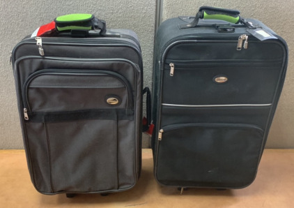 JAGUAR SUITCASE WITH WHEELS W/ AN AMERICAN TOURISTER SUITCASE WITH WHEELS; PLEASE INSPECT