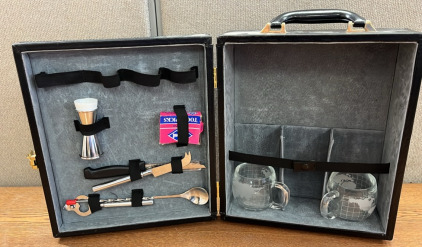 LOCKING PICNIC/ BARTENDER CASE W/ GLASSES, CHEESE KNIFES AND MORE . PLEASE INSPECT