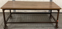 RUSTIC WOOD/METAL ROLLING COFFEE TABLE (4FT/2FT) PLEASE INSPECT