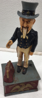 Ceramic Bookend; Trick Dog Bank; Uncle Sam Bank; Antique Wooden Toy; Antique Stove Figurine - 3