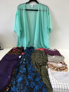 10 Assorted Large Pieces From LuLaRoe Clothing Line Including 4 Tops, 3 Skirts & 3 Smock’s