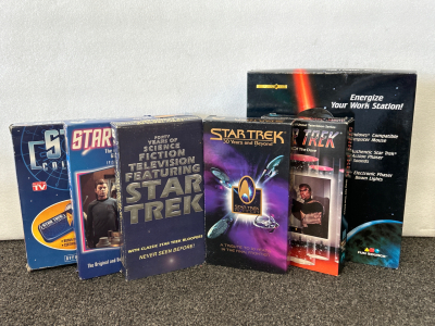 VINTAGE STAR TREK VHS MOVIES, COLLECTIBLE WATCH, AND TYPE 1 PHASER MOUSE