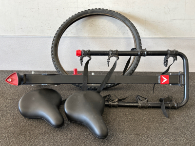 BICYCLE RACK, (2) BICYCLE SEATS, AND TIRE