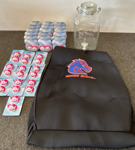 BOISE STATE CAR SEAT COVER (1), UNIVERSITY OF ALABAMA2-PACK PACIFIERS (28) AND A 2 GALLON GLASS COLD DRINK DISPENSER