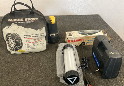 SET OF 2 FLASHLIGHTS, CAR AIR PUMP, AND LIKE NEW TIRE CHAINS