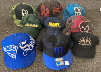 NINE HATS INCLUDING BUCKMASTER, SUPERMAN FLAT, MONSTER FLAT, CABELAS, NAVY, PUNISHER HAT, VIRTIS HATS