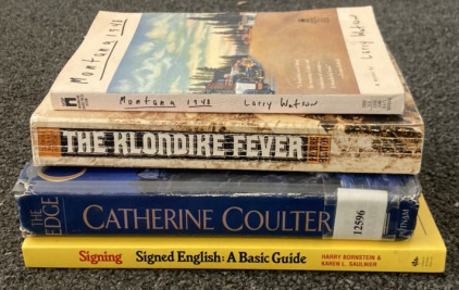 BOOKS INCLUDING MONTANA 1948, THE KLONDIKE FEVER, THE EDGE, SIGNING ENGLISH BASIC GUIDE