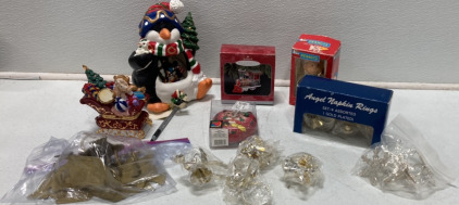 (1) Traditions 9&rsquo;&rsquo; Singing Penguin Decoration, (1) Peanuts Small Christmas Ornament, (4) Angel Napkin Holders And More