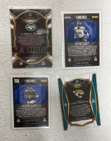 (4) 2020 Select Prizm Die Cut NFL Cards Such As Randy Moss, Joe Reed, Ezekiel Elliot And More, (10) NFL Select Prizm And Others Including C.J Ham, Cam Akers, D.K Metcalf And More - 2